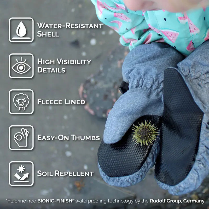 Jan & Jul Water-Resistant Cozy Dry Rain Mitten for babies, fleece-lined and easy-on thumbs, shown on a toddler outdoors.