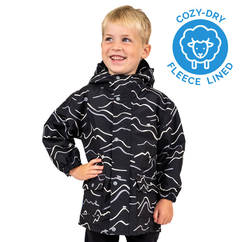 JAN & JUL Bear Mountain kids rain jacket, black with white wavy print, cozy dry lining