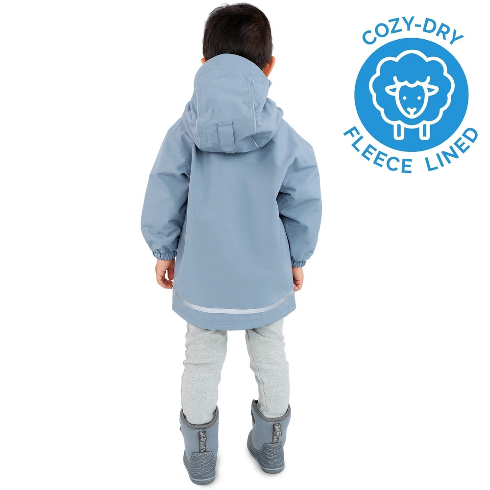 JAN & JUL kids' waterproof Cozy Dry rain jacket in dusty blue, hooded fleece-lined with reflective hem.