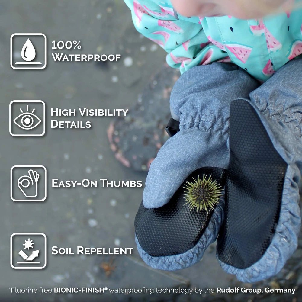 JAN & JUL Cozy Dry Bear toddler rain mitten in gray/black worn on a glove, showing easy-on thumb and 100% waterproof.