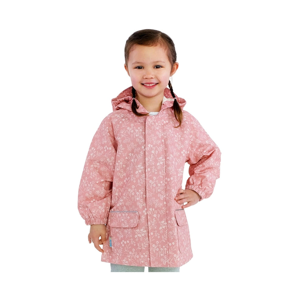JAN & JUL waterproof puddle-dry rain jacket Prairie Flowers, pink hooded kids coat with pockets, girl smiling.
