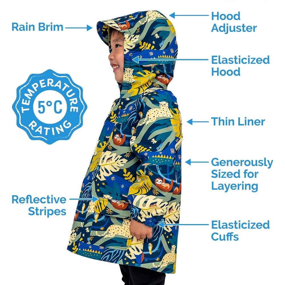 Jan & Jul Prairie Flowers rain jacket in blue with hood, worn by a child to show elastic cuffs and reflective stripes