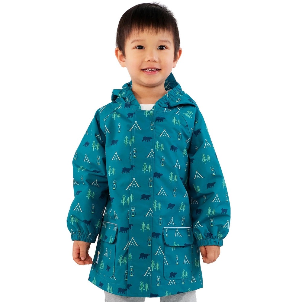JAN & JUL kids' teal waterproof rain jacket with hood, camping tents and trees pattern.