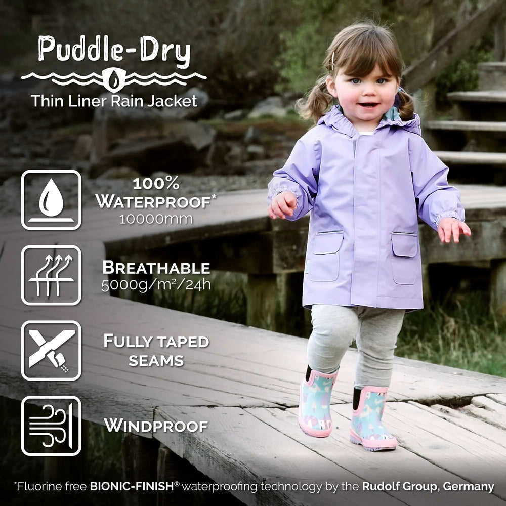 JAN & JUL Waterproof Puddle-Dry Rain Jacket yellow; toddler wears a breathable, taped-seam coat on a wooden boardwalk.