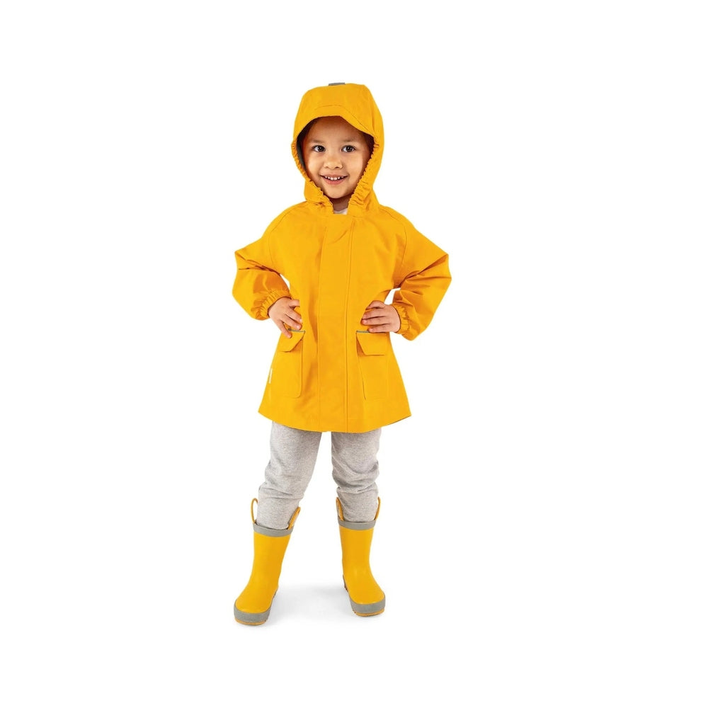 JAN & JUL Waterproof Puddle Dry Rain Jacket Yellow worn by a child in hood with hands on hips and front pockets.