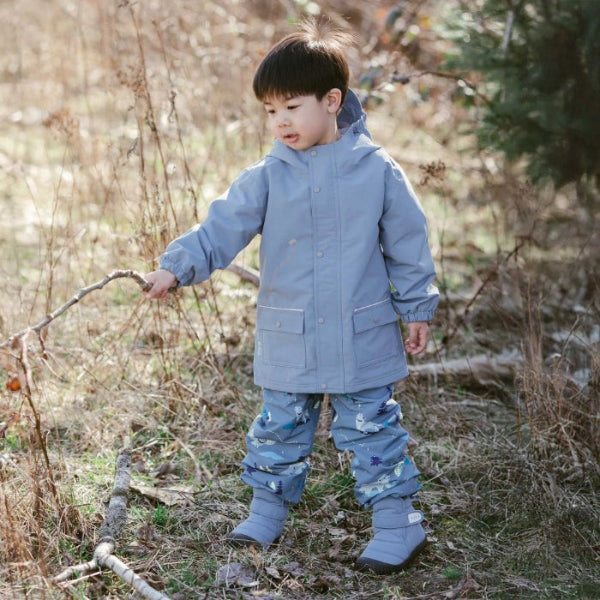 Jan & Jul waterproof rain pants for kids in blue with playful wolf and bear prints