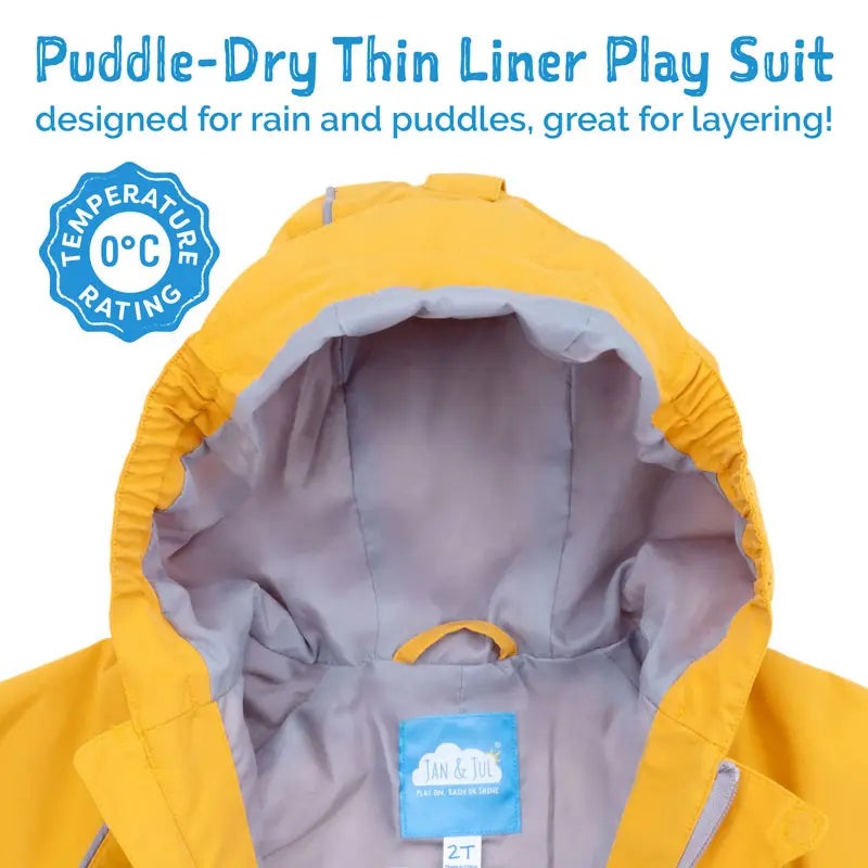 Jan & Jul Waterproof Puddle-Dry Rain Suit Enchanted, yellow with gray lining, hood on for rain protection.
