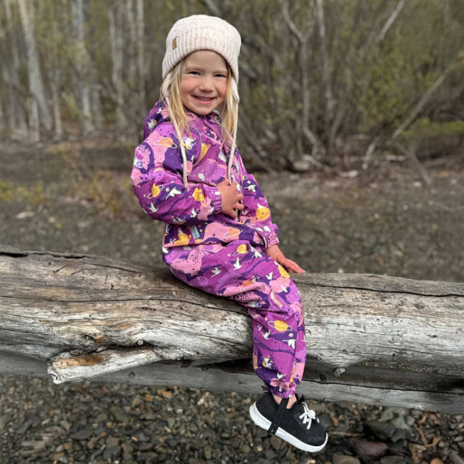 Jan & Jul Waterproof Puddle Dry Rain Suit Purple Dream for kids, purple pattern, worn by smiling child outdoors