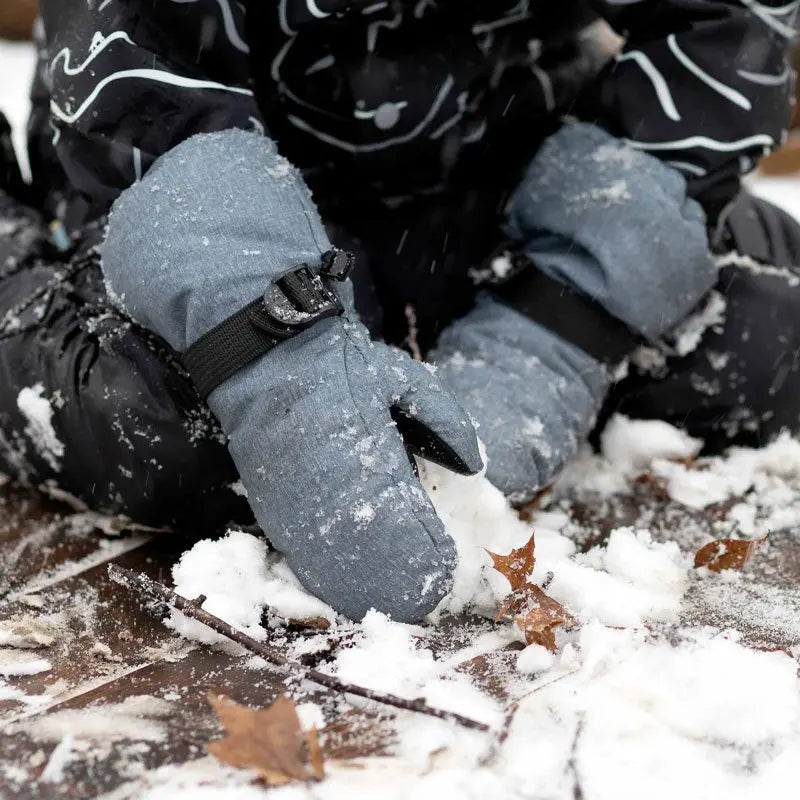 Jan & Jul Waterproof Toasty Dry Mitten Thumb Heather Grey; toddler snow-ready gloves with adjustable strap, shown digging in snow