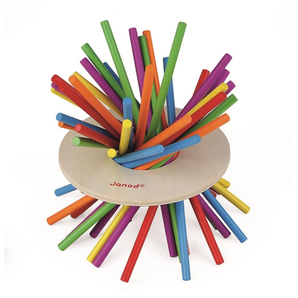 Janod Game of Skills Crazy Sticks set with colorful plastic rods around a beige base.