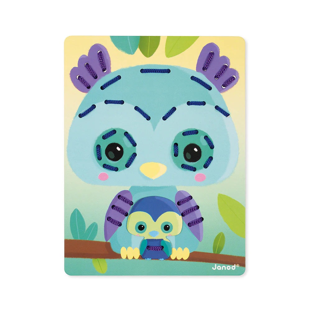 Janod Lacing Game Animals toy with a blue stitched bird and a small penguin on a branch