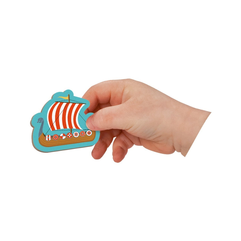 Janod Magnetibook History magnetic ship toy held in a hand; colorful wooden educational toy