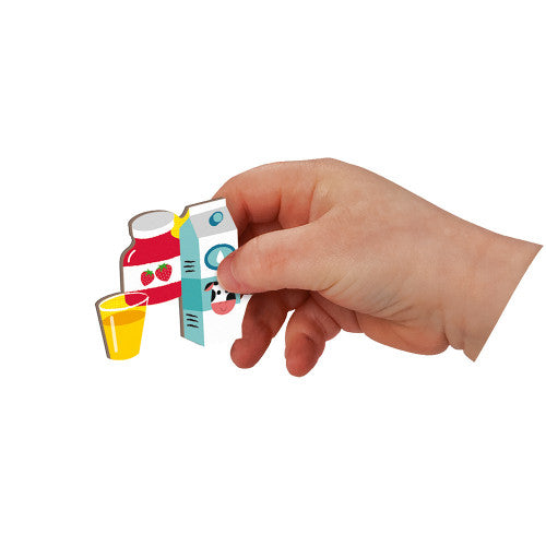 Janod Magnetibook Learn To Tell The Time educational toy with magnetic clock pieces held by hand