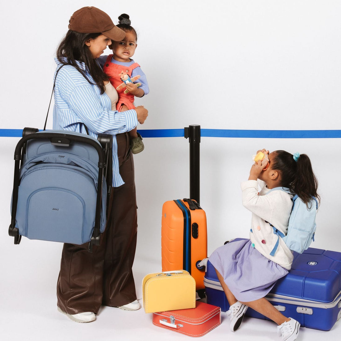 Joolz Dot Lightweight Stroller - folded stroller carried at airport