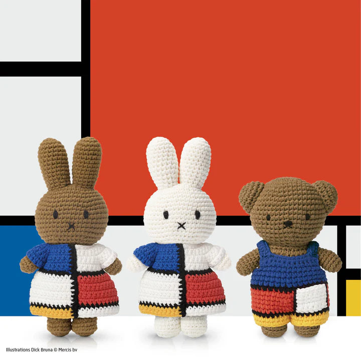 Just Dutch Miffy Piet Mondrian Inspired Dress plush rabbits in color-block outfits stand side by side.