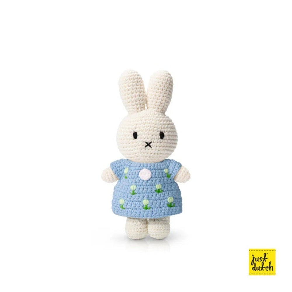 Just Dutch Miffy Tulip Dress Pastel Blue crochet bunny plush standing upright in a blue dress with small green tulips.