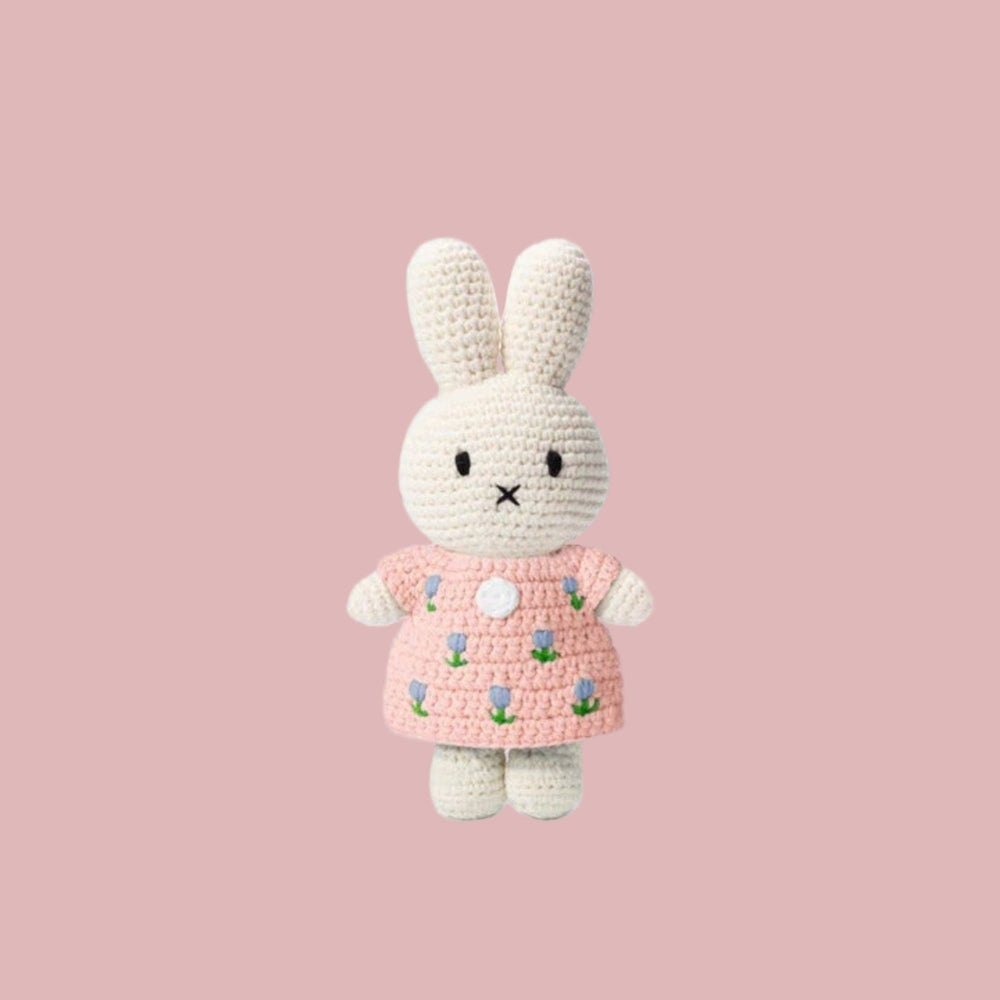 Just Dutch Miffy Tulip Dress Pastel Pink crochet bunny plush standing in a pink dress with tulips