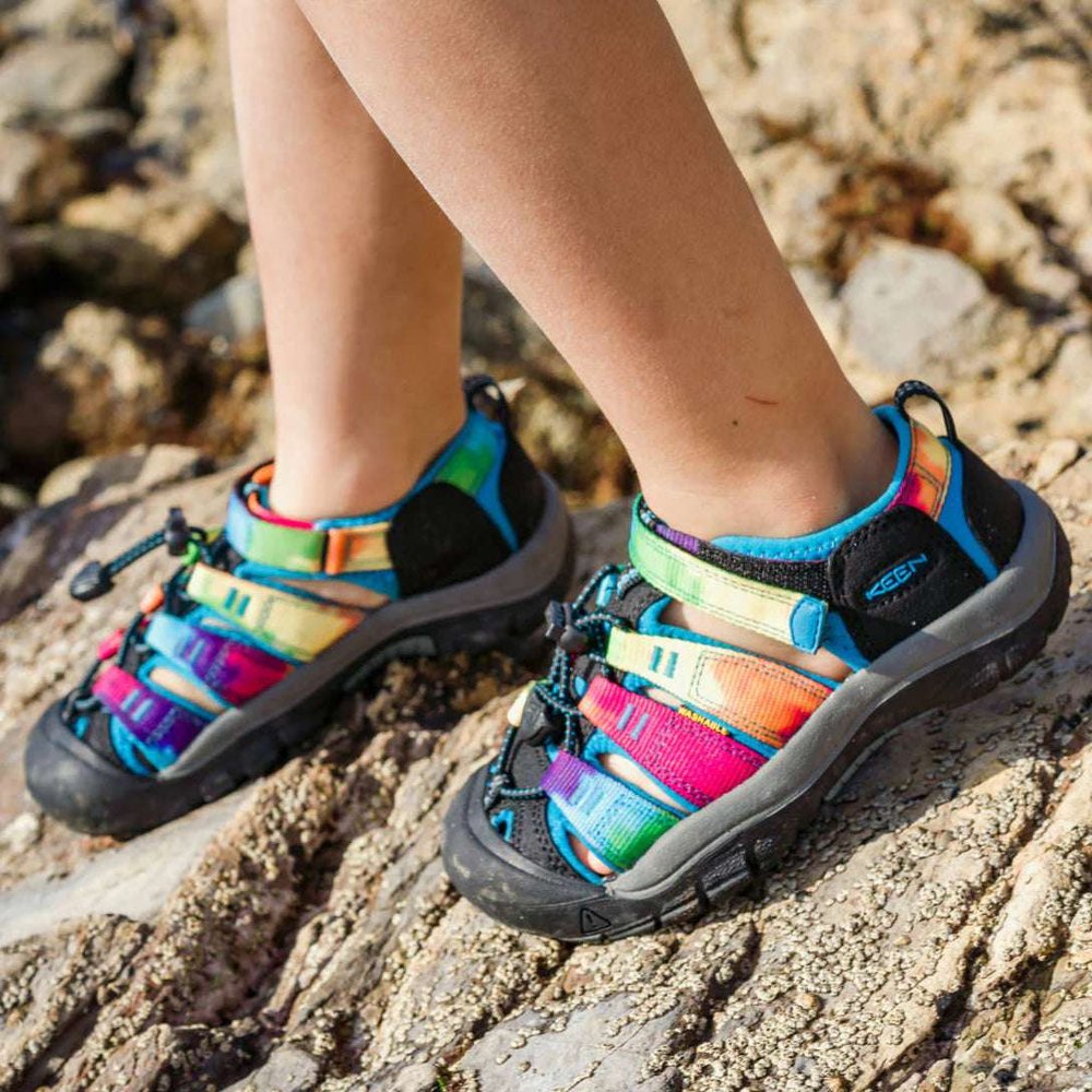KEEN Big Kids Newport H2 Sandal with rainbow straps, black sole, blue trim