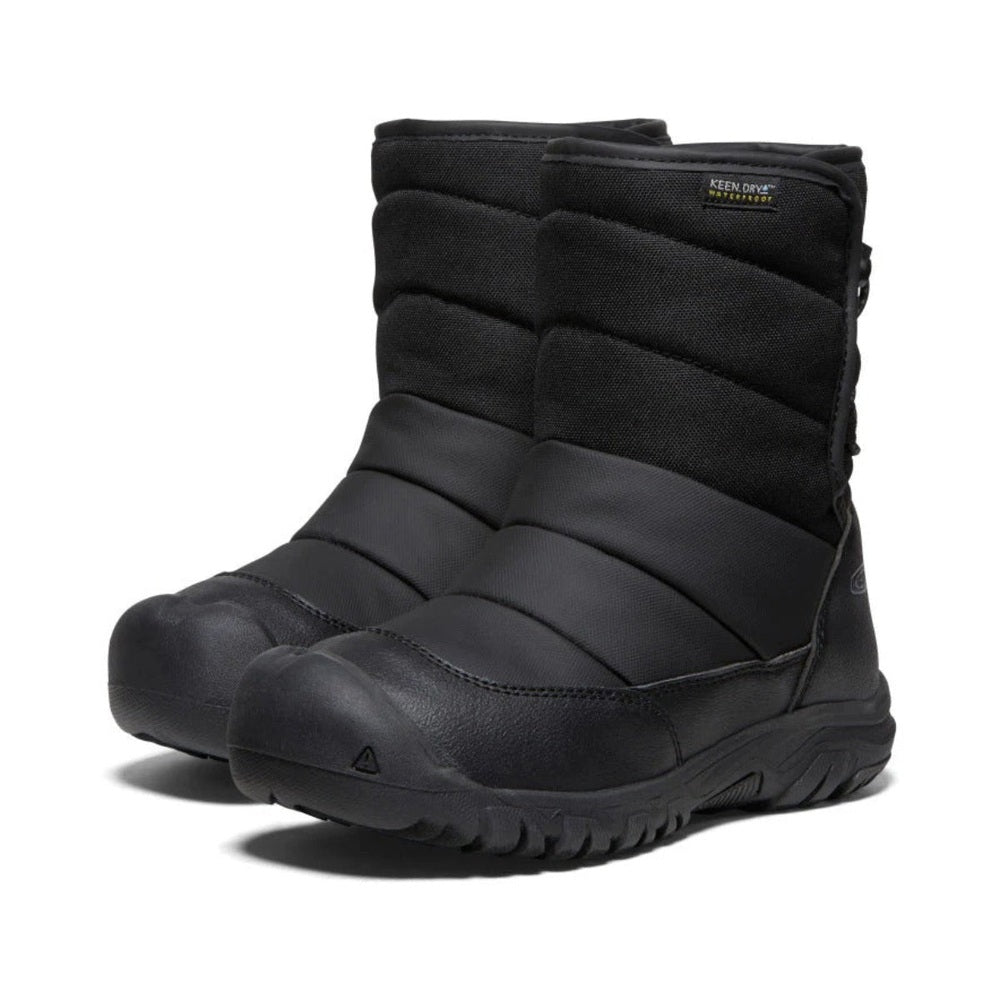 KEEN Big Kids' Puffrider Waterproof Winter Boot Black steel grey, two boots standing upright with rugged tread.