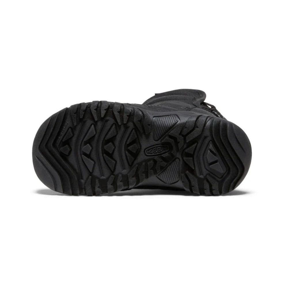KEEN Little Kids' Puffrider Waterproof Winter Boot Black Steel Grey, outsole facing camera to show rugged traction tread.