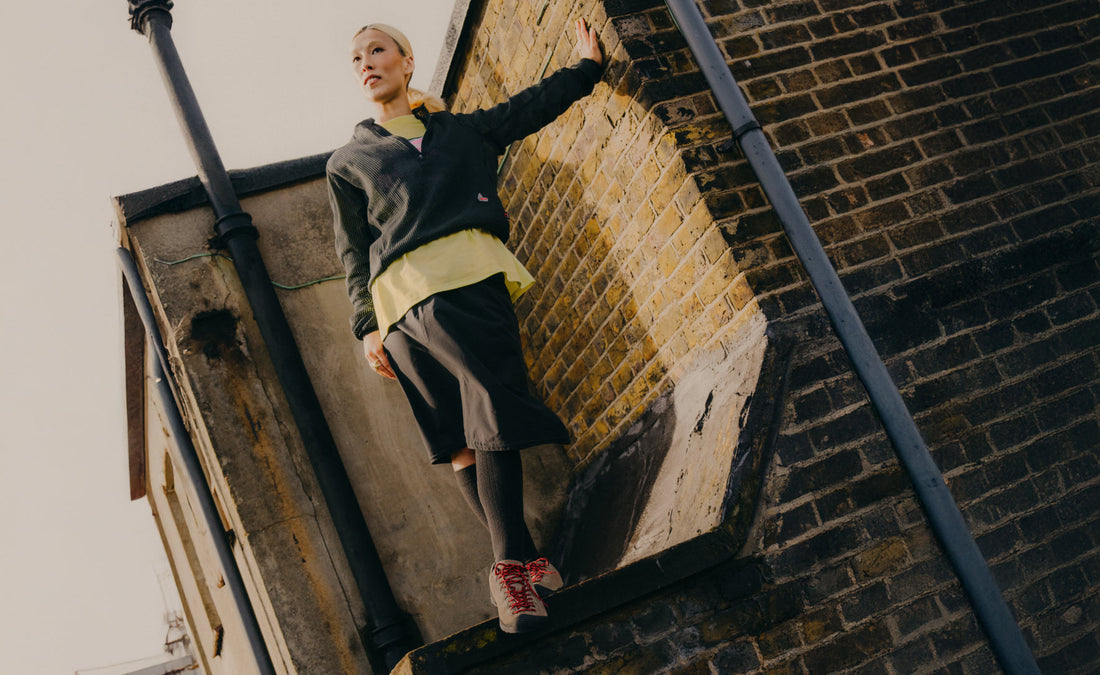 Keen Women's Jasper Sneaker Silver Mink - woman wearing Silver Mink Jasper sneakers beside a brick wall
