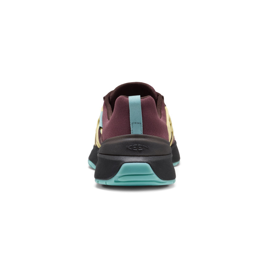 Keen Women's UNEEK Trekker Sneaker Huckleberry/Lemon Grass - heel view showing the rear pull tab and outsole