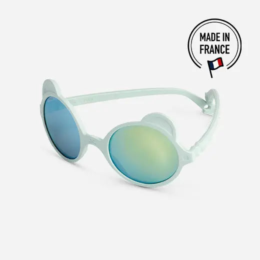 Ki Et La Sunglasses Ourson Almond Green kids sunglasses with blue mirrored lenses shown on white background