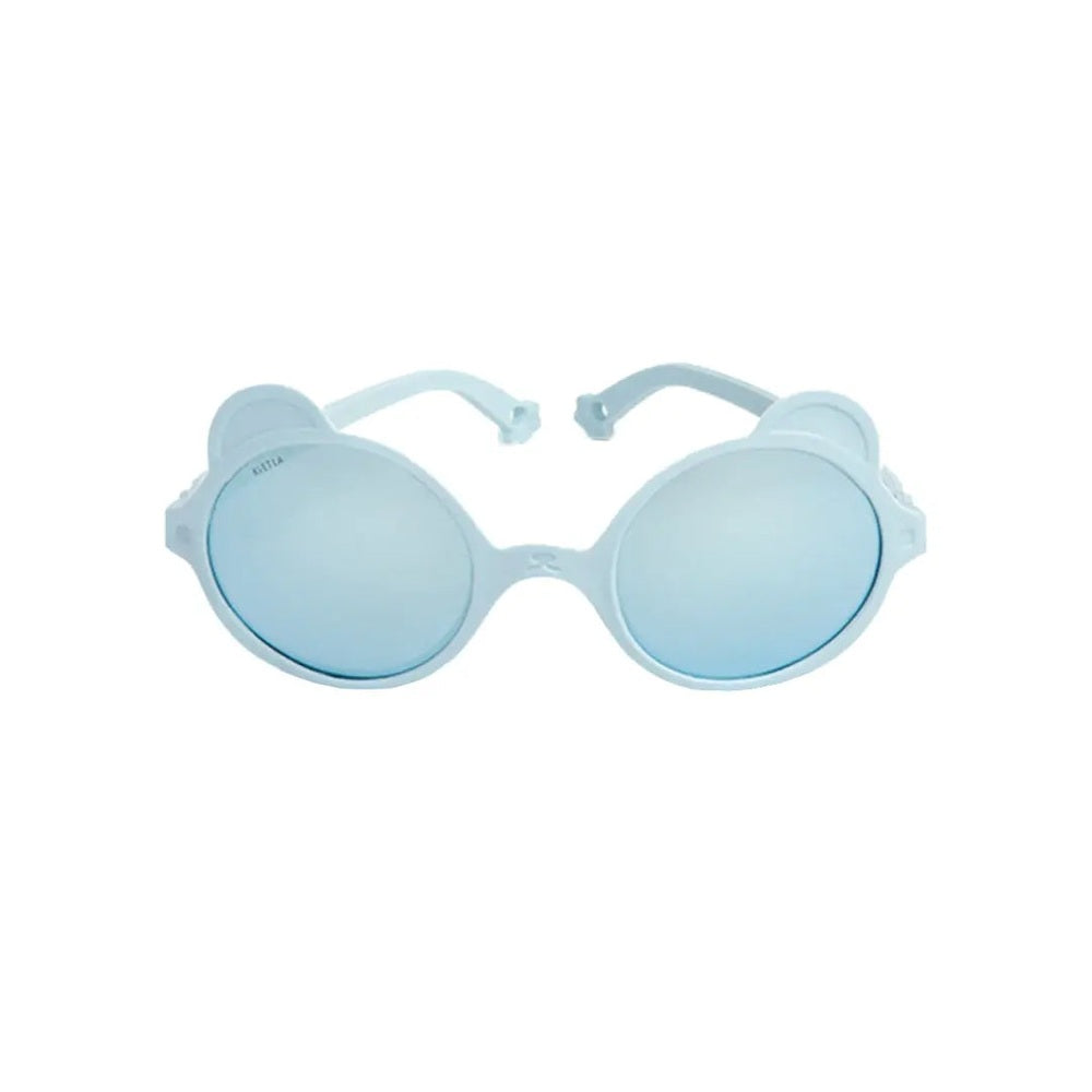 Ki Et La Ourson Sunglasses Sky Blue for toddlers, round mirrored lenses, soft lightweight frame shown laid flat with extended arms.