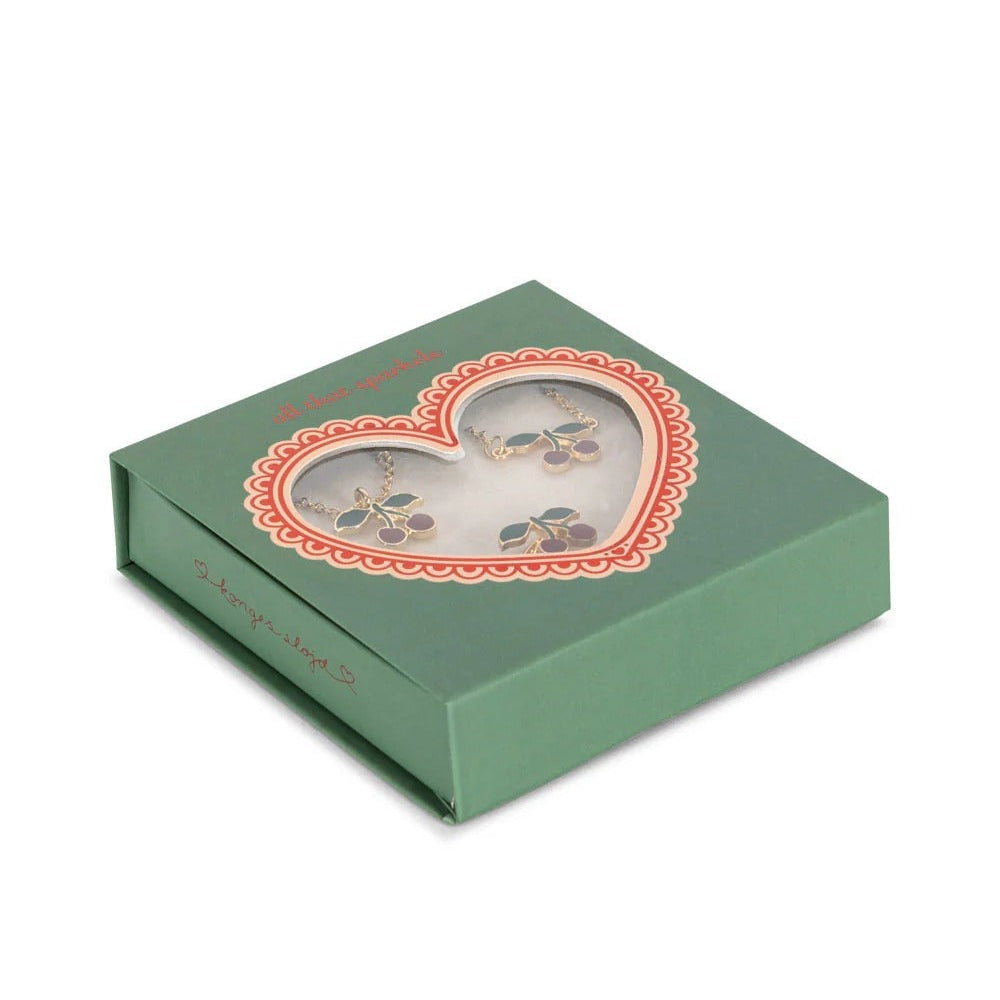 Konges Slojd Cherry Jewelry Set Gold in a green box with a heart window displaying the pieces