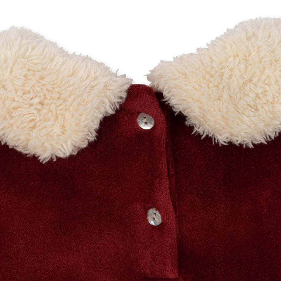 Konges Slojd Christmas Dress Red Dahlia, deep red velvet with cream shearling collar and silver buttons.