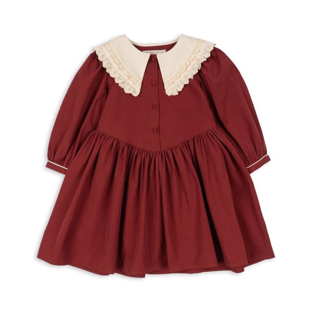 Konges Slojd Coeur Dress Red Dahlia: burgundy baby dress with cream lace collar, button front, and gathered waist.