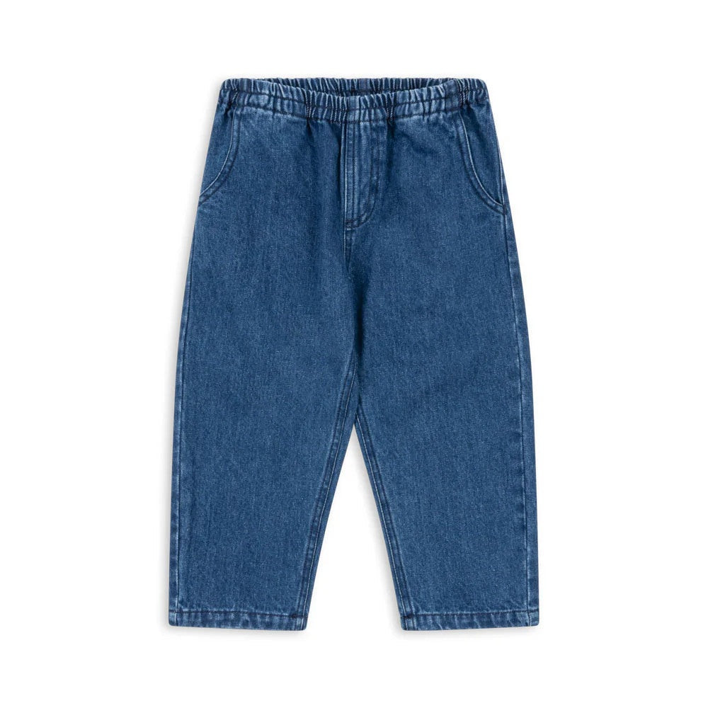 Konges Slojd Denim Pants Gots Denim Blue laid flat, elastic waistband, front pockets, for babies/toddlers.