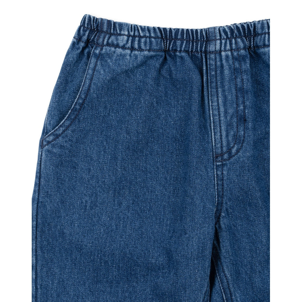 Konges Slojd Denim Pants GOTS Denim Blue with elastic waist, showing front pocket and sturdy denim texture