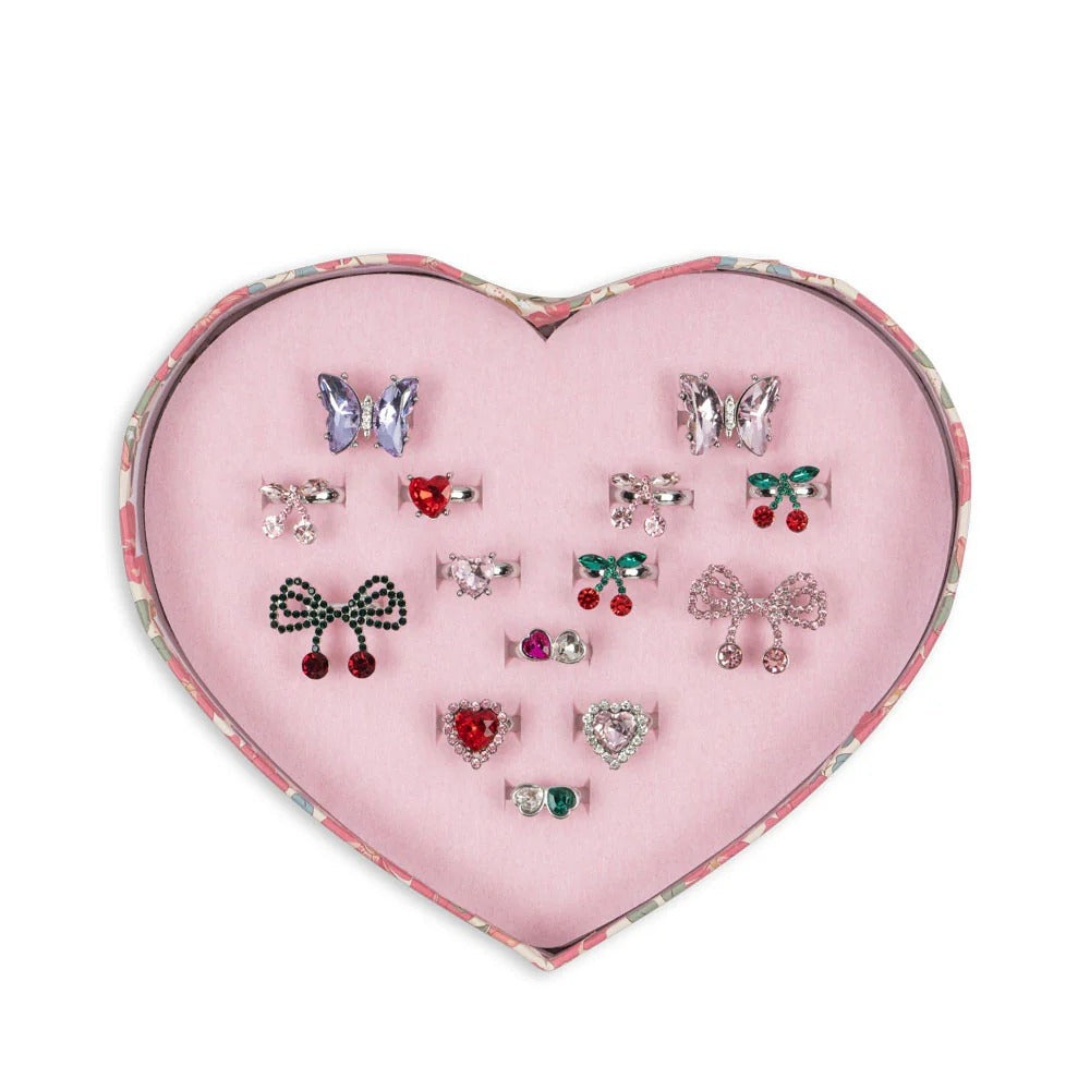 Konges Slojd Dreamy Ring Set 14 Pcs displayed in a pink heart-shaped box with assorted crystal rings and bows.