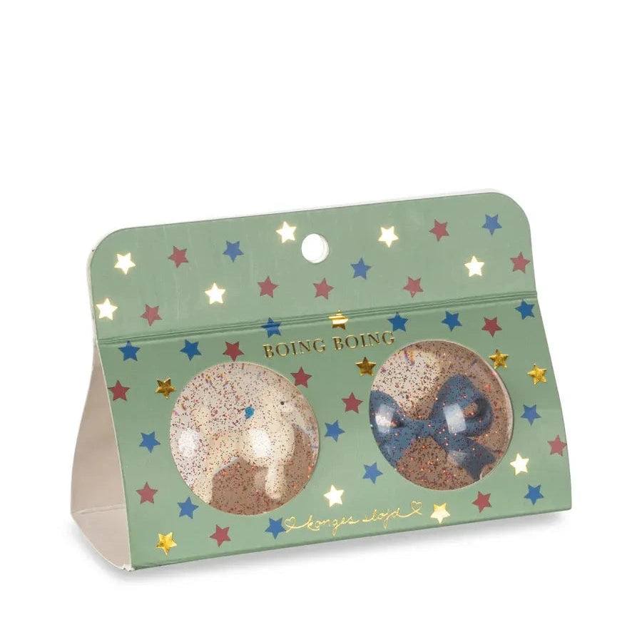 Konges Slojd Glitter Bouncing Ball Set Poodle/Bow in mint starry packaging with two glittery balls