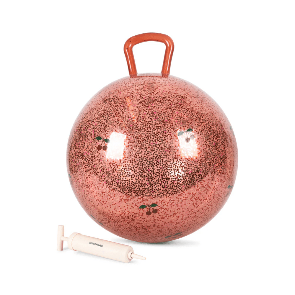 Konges Slojd Glitter Glitter Jump Ball Cherry, pink glittery bouncy ball with pump for outdoor play.