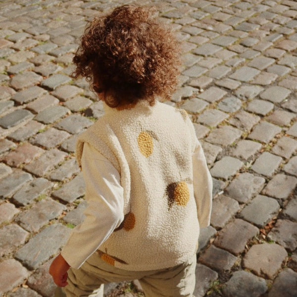 Konges Slojd Jody Teddy Vest Mon Grand Citron for toddlers; cream sherpa with mustard patches