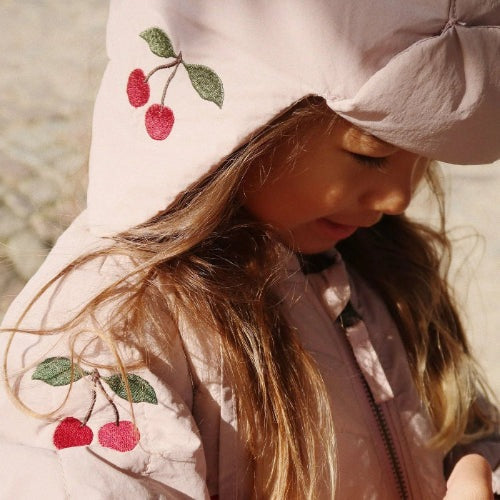 Konges Slojd Juna Bomber Jacket Twilight Mauve with cherry embroidery, hooded, on a girl