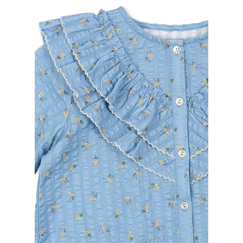 Konges Slojd Kim Frill Blouse Billie Blue front view with button closure, gathered frill sleeves, white lace trim.