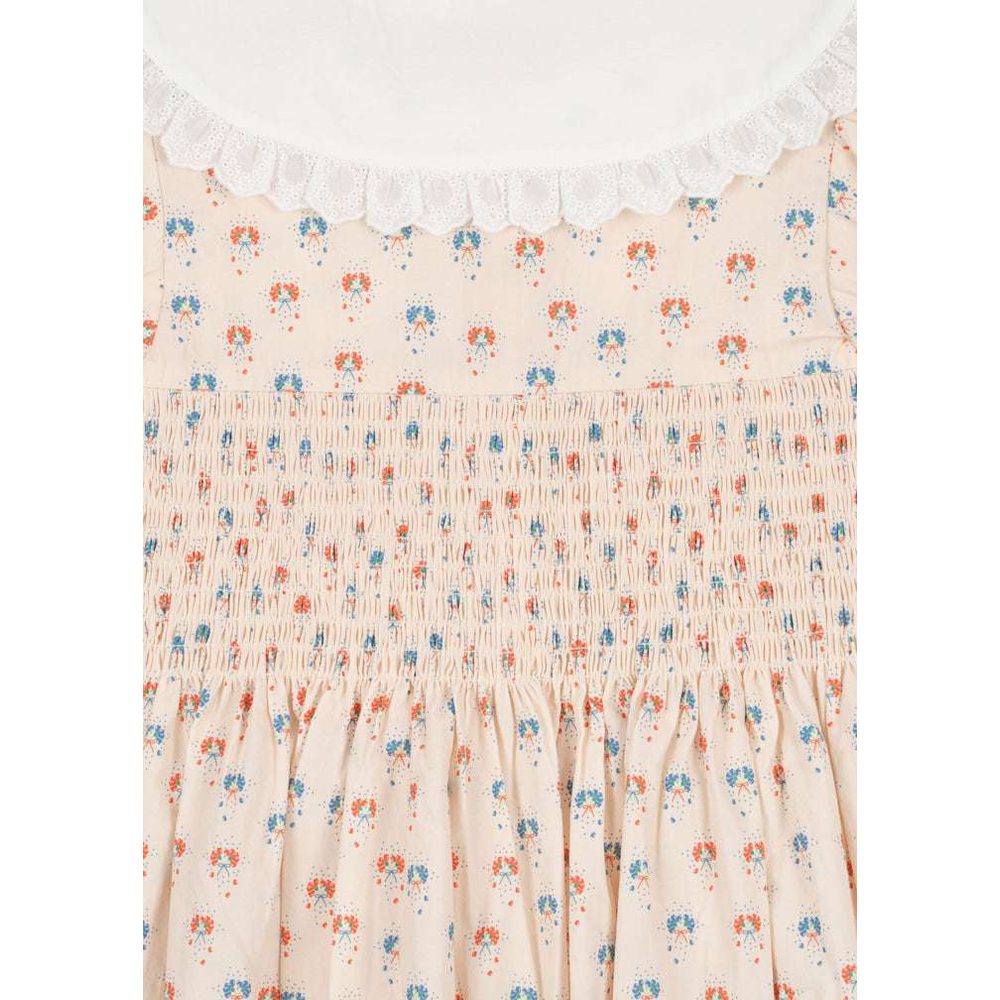 Konges Slojd Midsummer Dress GOTS Pipa Petite, cream fabric with tiny red and blue florals and lace-trim neckline
