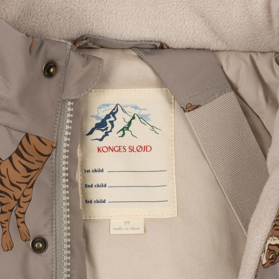 Konges Slojd Mismou Jacket Tiger Oak; grey baby coat with tiger-print lining, zipper front and inner brand tag.