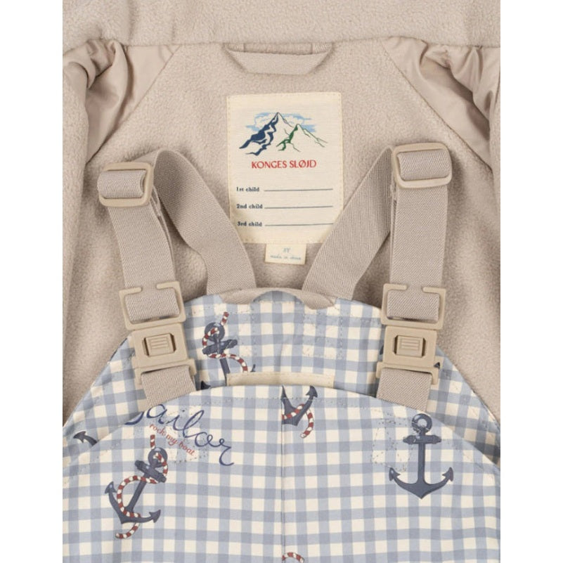 Konges Slojd Rainy Palme Set Sailor Check; beige fleece outer with adjustable straps and blue gingham sailor print