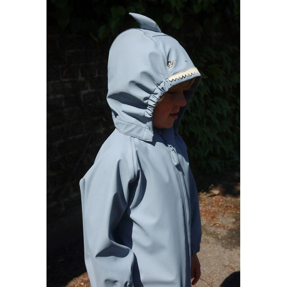 Konges Slojd Sharka Rain Set in Tradewinds blue with shark hood, side view.
