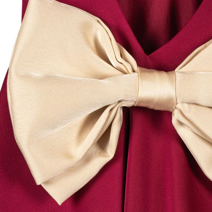 Konges Slojd Sheena Dress Sangria: baby dress in burgundy with an oversized cream bow tied at the waist.