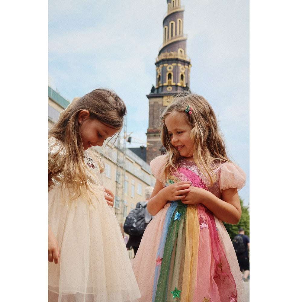 Konges Slojd Starla Puff Sleeve Dress Gold Blush; two girls in pastel tulle dresses.
