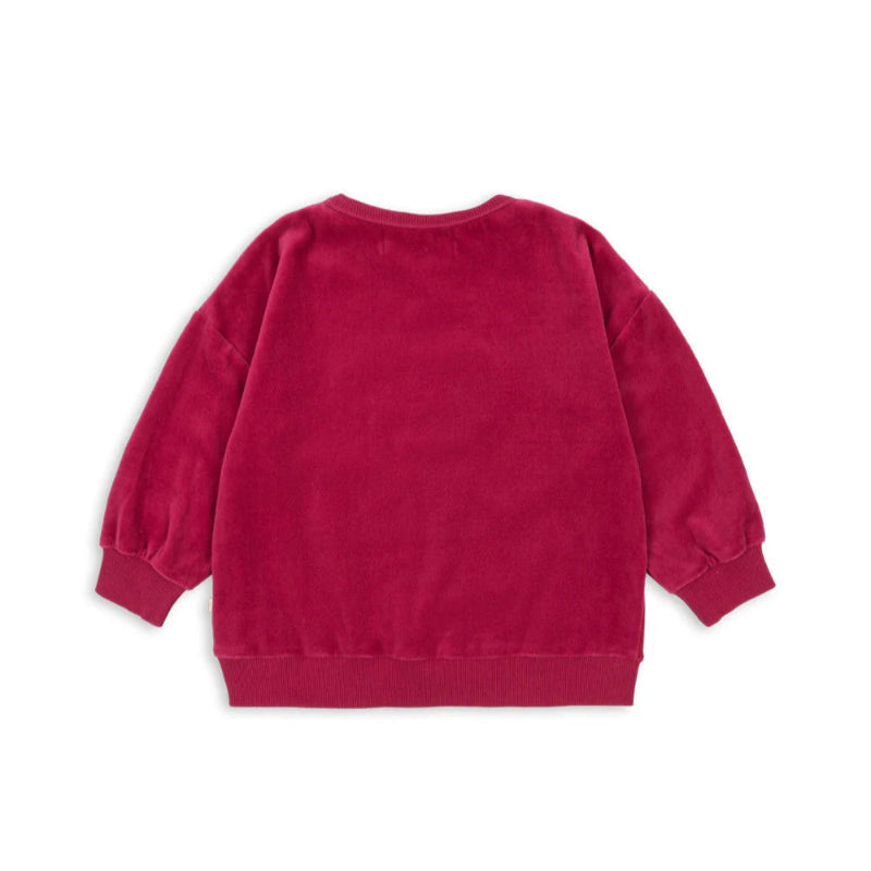 Konges Slojd Velour Blouse in sangria red; velour fabric, long-sleeve kids' sweatshirt with rib cuffs.