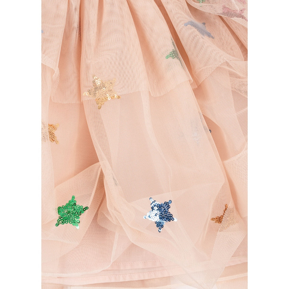 Konges Slojd Yvonne Fairy Dress Multi Star in peach tulle, colorful sequin stars scattered on voluminous layers.