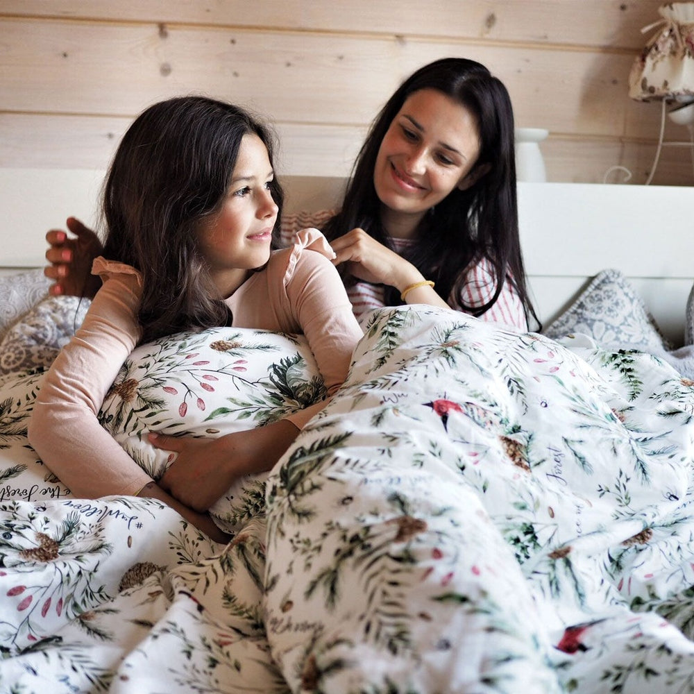 La Millou bedding set with filling, adult XL, floral duvet on bed with two women.