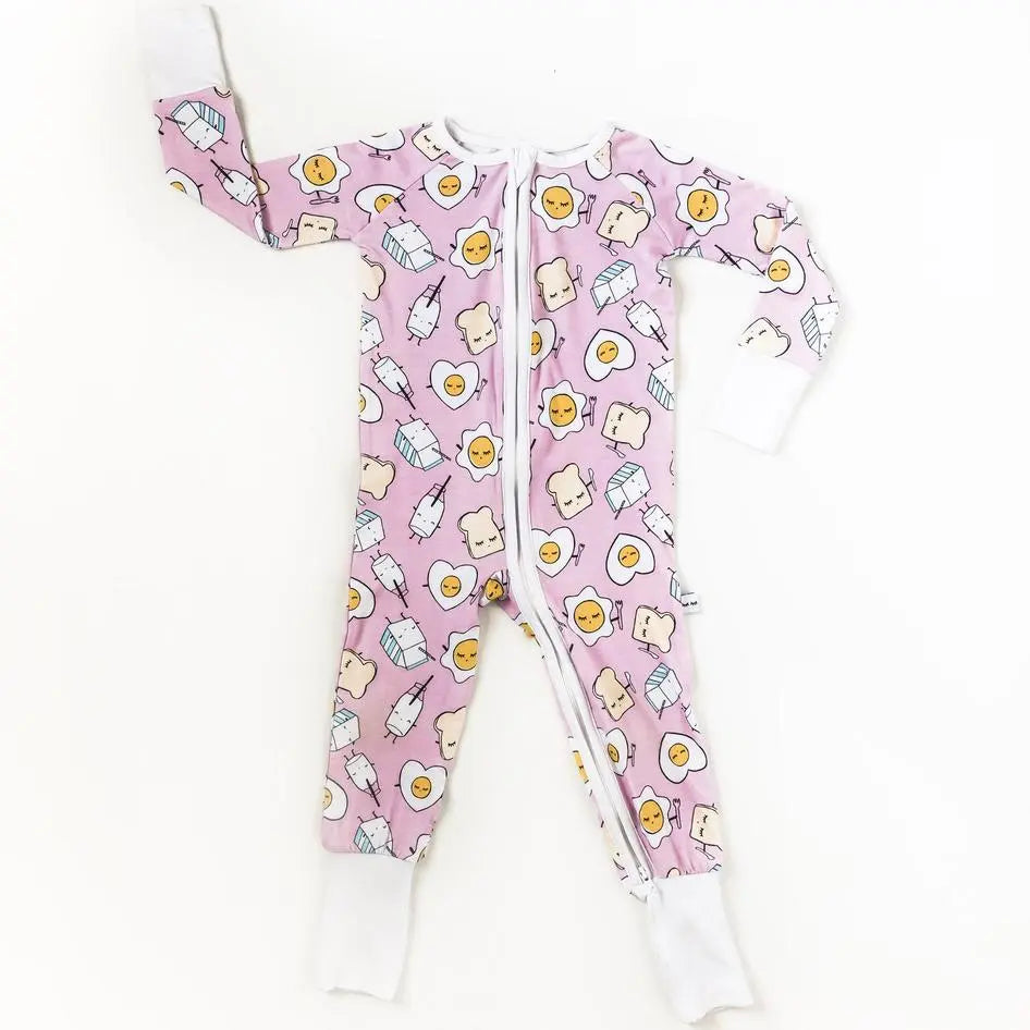 Little Sleepies Bamboo Zip Romper Sleeper in Pink Breakfast print with white cuffs and full-length zipper.