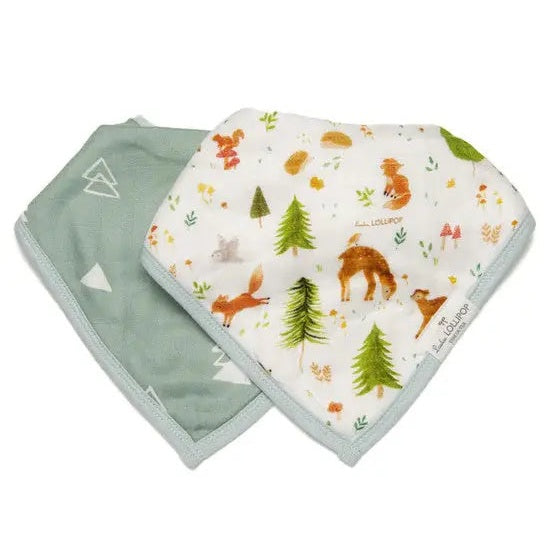 Loulou Lollipop Bandana Bib Set: two bibs laid flat, woodland animals and sage-green geometric print.